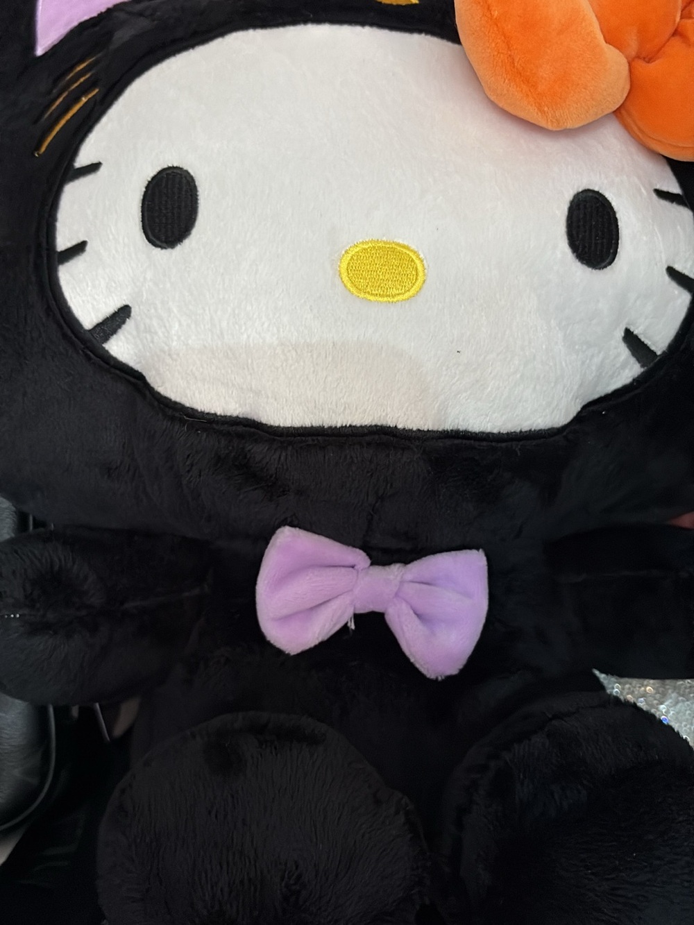 Hello Kitty Plush in Black with Purple and Orange Accents I am a book bag